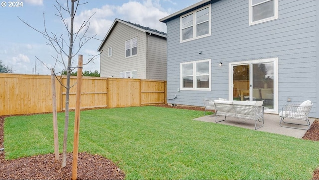 view of yard featuring a fenced backyard and a patio