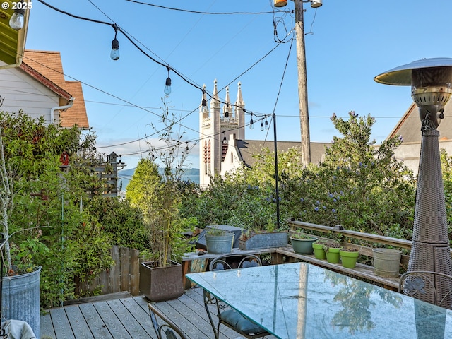 1078 Harrison Ave, Astoria, OR 97103 - wooden deck featuring outdoor dining space