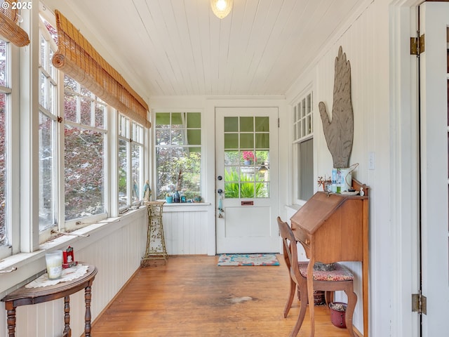 1078 Harrison Ave, Astoria, OR 97103 - sunroom with healthy amount of natural light, wood finished floors, french doors, and wood ceiling