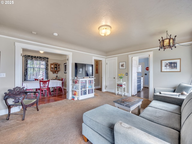 1078 Harrison Ave, Astoria, OR 97103 - carpeted living room featuring baseboards