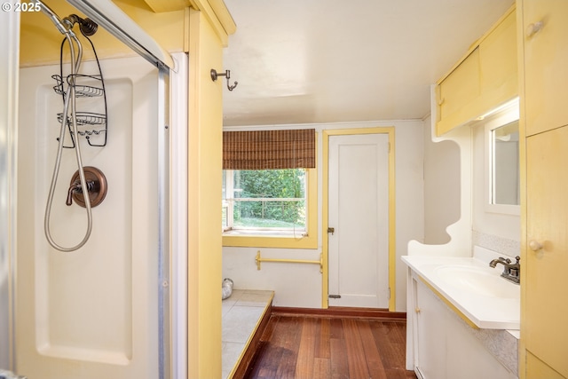 32468 Dillard Rd, Eugene, OR 97405 - full bathroom featuring hardwood / wood-style flooring, vanity, and a shower