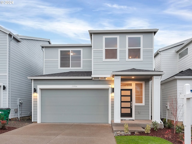 view of front of property with a garage