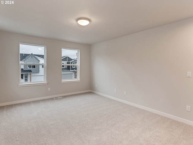 unfurnished room with carpet