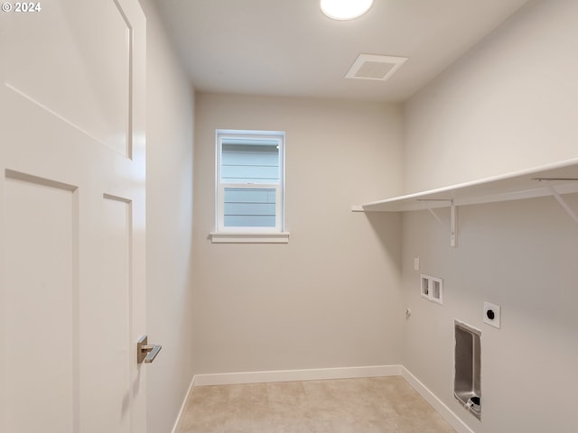 laundry room featuring gas dryer hookup, electric dryer hookup, and washer hookup