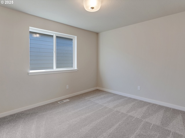 13863 SW Sabrina Ave, Tigard, OR 97140 - carpeted empty room featuring baseboards