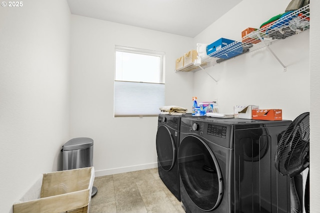 laundry area featuring washing machine and dryer