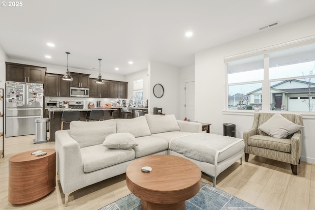 living room featuring light hardwood / wood-style flooring