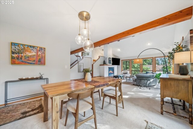 13305 Fox Run, Lake Oswego, OR 97034 - dining area featuring light colored carpet, a lit fireplace, stairway, and recessed lighting