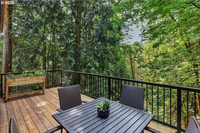 13305 Fox Run, Lake Oswego, OR 97034 - wooden terrace featuring outdoor dining space and a view of trees