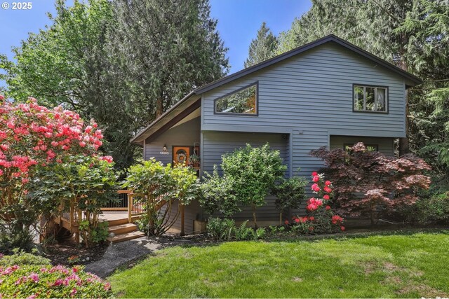 13305 Fox Run, Lake Oswego, OR 97034 - view of property exterior with a deck and a lawn