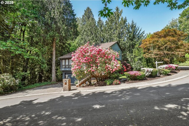 13305 Fox Run, Lake Oswego, OR 97034 - view of front facade with driveway, a garage, and stairway