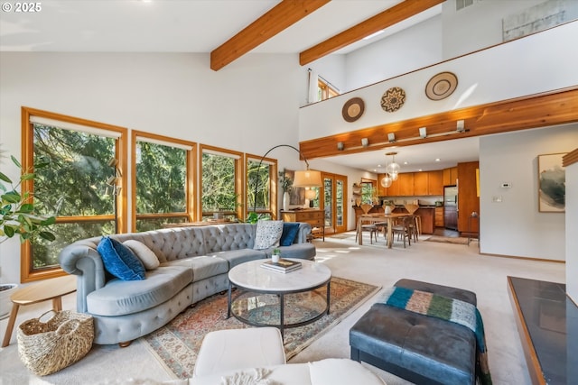 13305 Fox Run, Lake Oswego, OR 97034 - living room featuring high vaulted ceiling, light colored carpet, and beamed ceiling