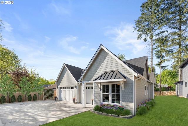 15007 Twin Fir Rd, Lake Oswego, OR 97035 - view of front of home with a garage, concrete driveway, a standing seam roof, a shingled roof, and a metal roof