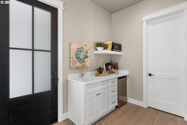 15007 Twin Fir Rd, Lake Oswego, OR 97035 - indoor bar featuring light wood-style flooring and refrigerator