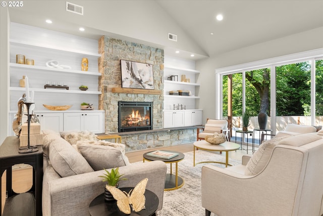 15007 Twin Fir Rd, Lake Oswego, OR 97035 - living area featuring healthy amount of natural light, a fireplace, wood finished floors, recessed lighting, and high vaulted ceiling