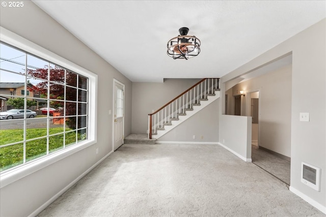 4004 SE 97th, Portland, OR 97266 - carpeted entrance foyer featuring stairs and baseboards