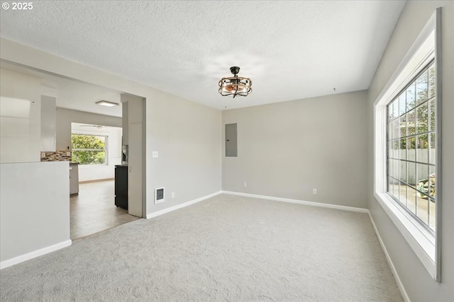 4004 SE 97th, Portland, OR 97266 - unfurnished room with electric panel, carpet, baseboards, and a textured ceiling