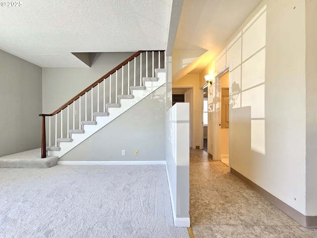 4004 SE 97th, Portland, OR 97266 - stairway featuring carpet, baseboards, and a textured ceiling