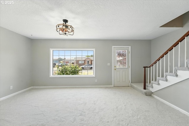 4004 SE 97th, Portland, OR 97266 - entryway featuring carpet flooring, stairs, baseboards, and a textured ceiling