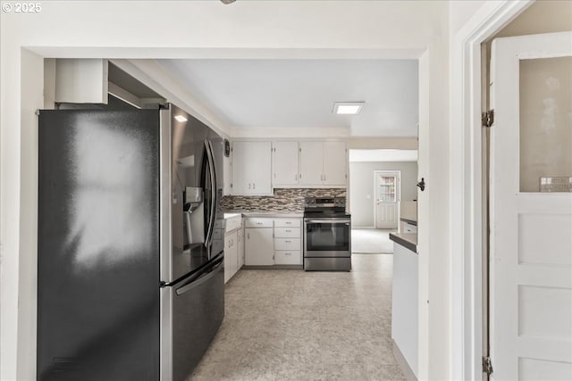 4004 SE 97th, Portland, OR 97266 - kitchen featuring stainless steel appliances, white cabinetry, and backsplash