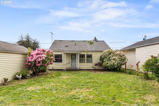 4004 SE 97th, Portland, OR 97266 - rear view of house featuring a yard