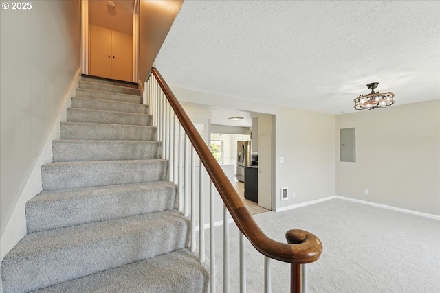 4004 SE 97th, Portland, OR 97266 - stairway featuring electric panel, carpet floors, a textured ceiling, and baseboards