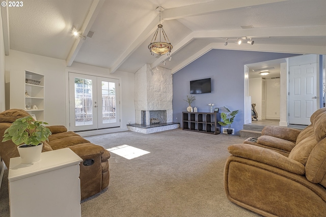 1060 SW 206th Ave, Beaverton, OR 97003 - living room with rail lighting, french doors, carpet, vaulted ceiling with beams, and a high end fireplace