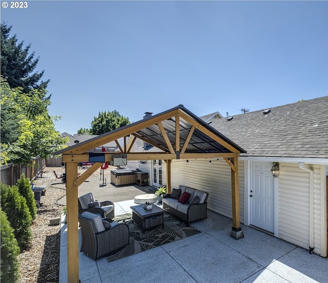 1060 SW 206th Ave, Beaverton, OR 97003 - view of patio with a hot tub, fence, a gazebo, and outdoor lounge area