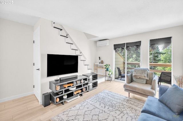 50 Cervantes Cir, Lake Oswego, OR 97035 - living area featuring a wall mounted AC, wood finished floors, and stairs