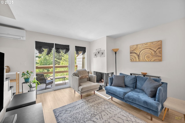 50 Cervantes Cir, Lake Oswego, OR 97035 - living area featuring a wall mounted AC and wood finished floors
