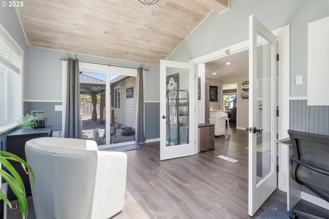3141 SW 176th Ave, Beaverton, OR 97003 - interior space featuring wood ceiling, wainscoting, vaulted ceiling, french doors, and wood finished floors