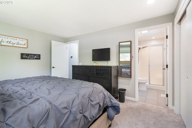 3141 SW 176th Ave, Beaverton, OR 97003 - carpeted bedroom with connected bathroom, recessed lighting, and tile patterned flooring