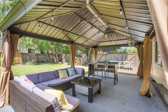 3141 SW 176th Ave, Beaverton, OR 97003 - fenced backyard with an outdoor hangout area, a gazebo, a patio, and outdoor dining space