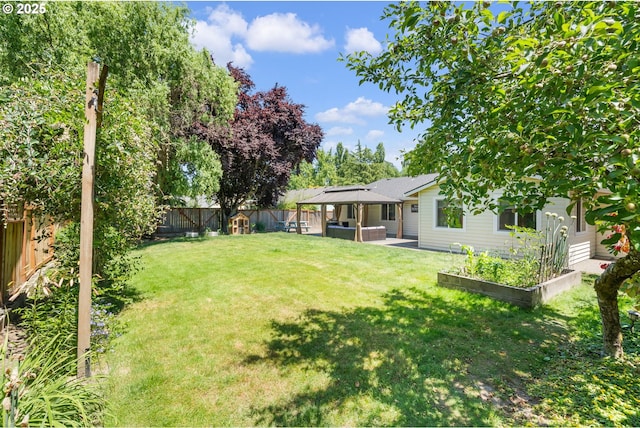 3141 SW 176th Ave, Beaverton, OR 97003 - fenced backyard with a gazebo, a vegetable garden, and a patio