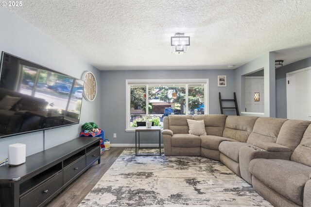 3141 SW 176th Ave, Beaverton, OR 97003 - living area featuring dark wood-type flooring and a textured ceiling