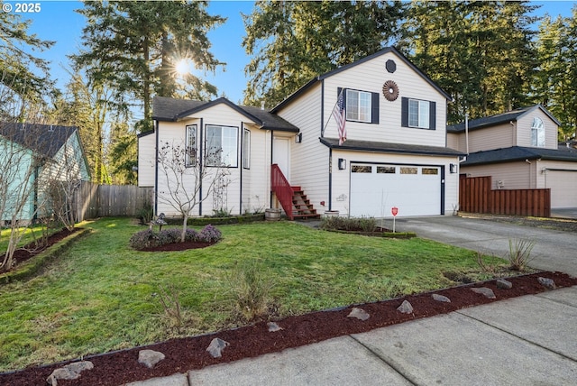 view of front of property with a garage and a front lawn