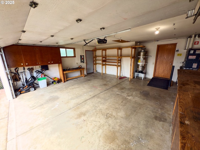 3880 SW 194th Pl, Beaverton, OR 97078 - garage with a garage door opener, secured water heater, and electric panel