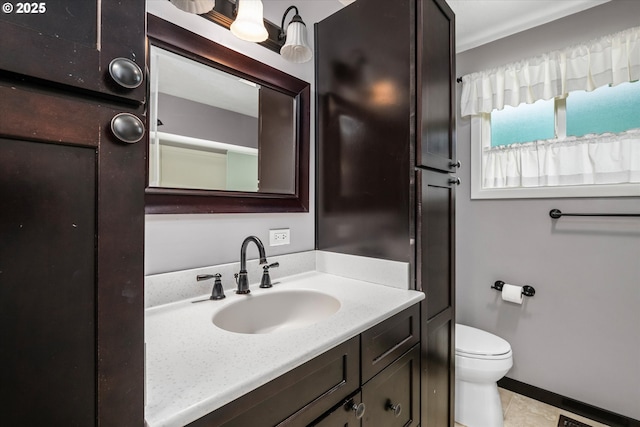 3985 Donald St, Eugene, OR 97405 - full bathroom with vanity, toilet, and tile patterned floors
