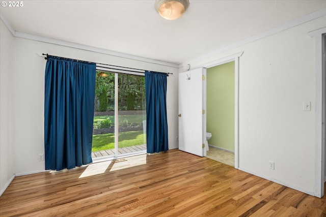 3985 Donald St, Eugene, OR 97405 - empty room with light wood-style floors and ornamental molding