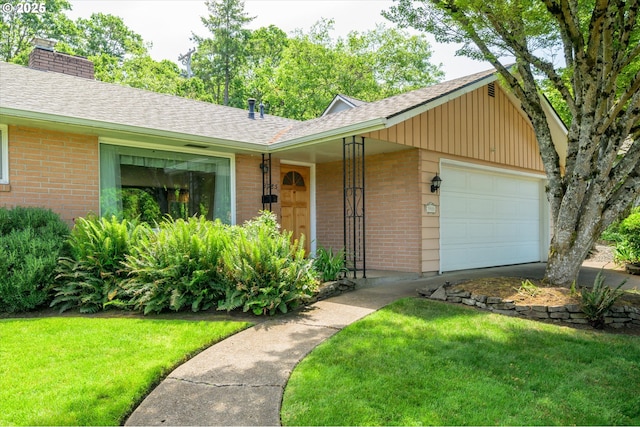 3985 Donald St, Eugene, OR 97405 - ranch-style home featuring brick siding, a front yard, and an attached garage