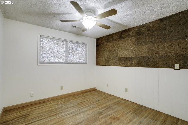 4805 NE 122nd Ave, Vancouver, WA 98682 - unfurnished room with wood finished floors, a textured ceiling, and ceiling fan
