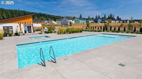 7417 N 92nd Ave, Camas, WA 98607 - community pool with a patio and a residential view