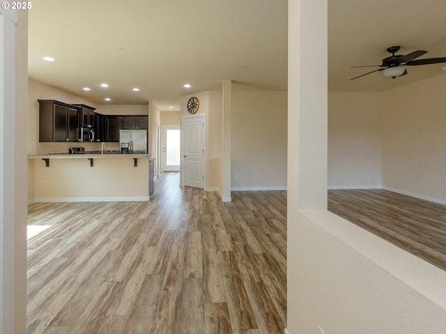 7417 N 92nd Ave, Camas, WA 98607 - kitchen featuring open floor plan, stainless steel appliances, light wood-style floors, and recessed lighting
