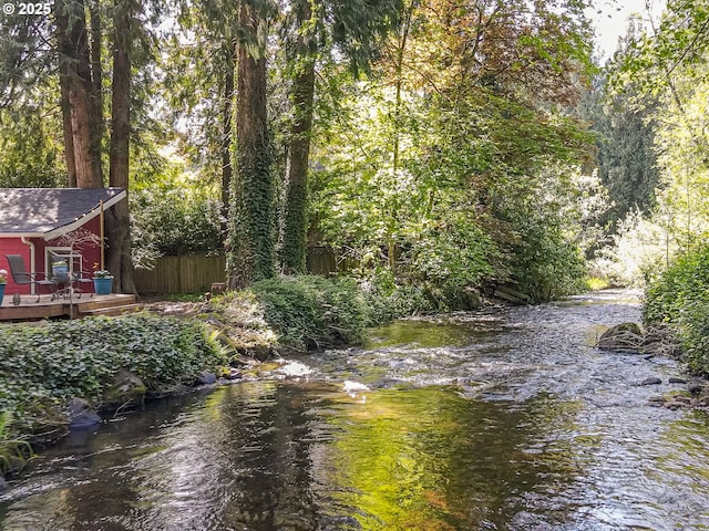 property view of water with fence