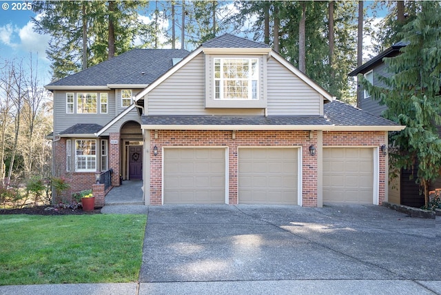 view of front facade featuring brick siding, roof with shingles, concrete driveway, and a front yard