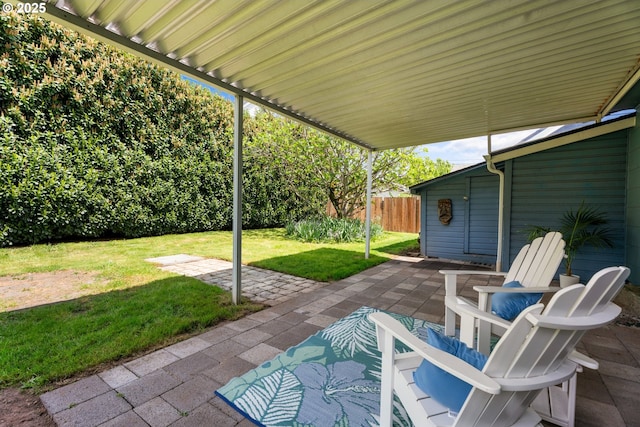 view of patio / terrace featuring fence