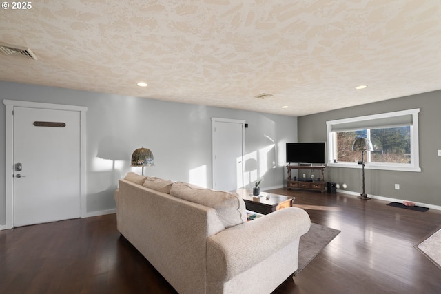 living room featuring dark wood-type flooring