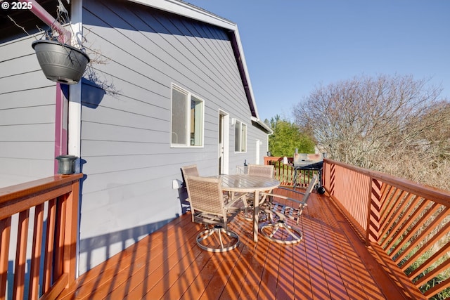 wooden deck featuring grilling area