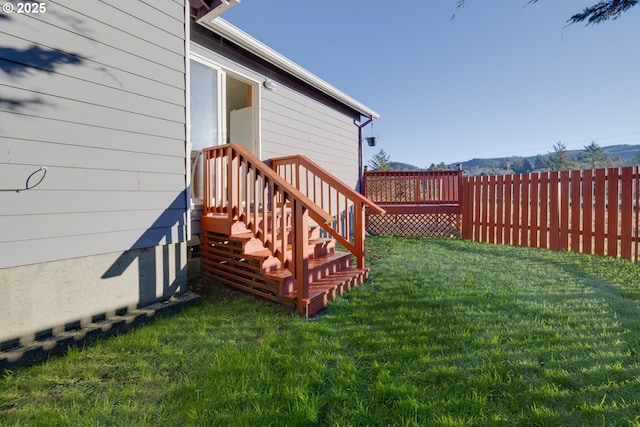 view of yard featuring a wooden deck