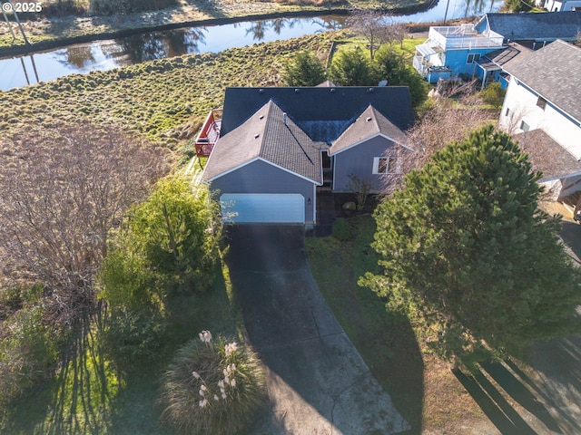 birds eye view of property featuring a water view